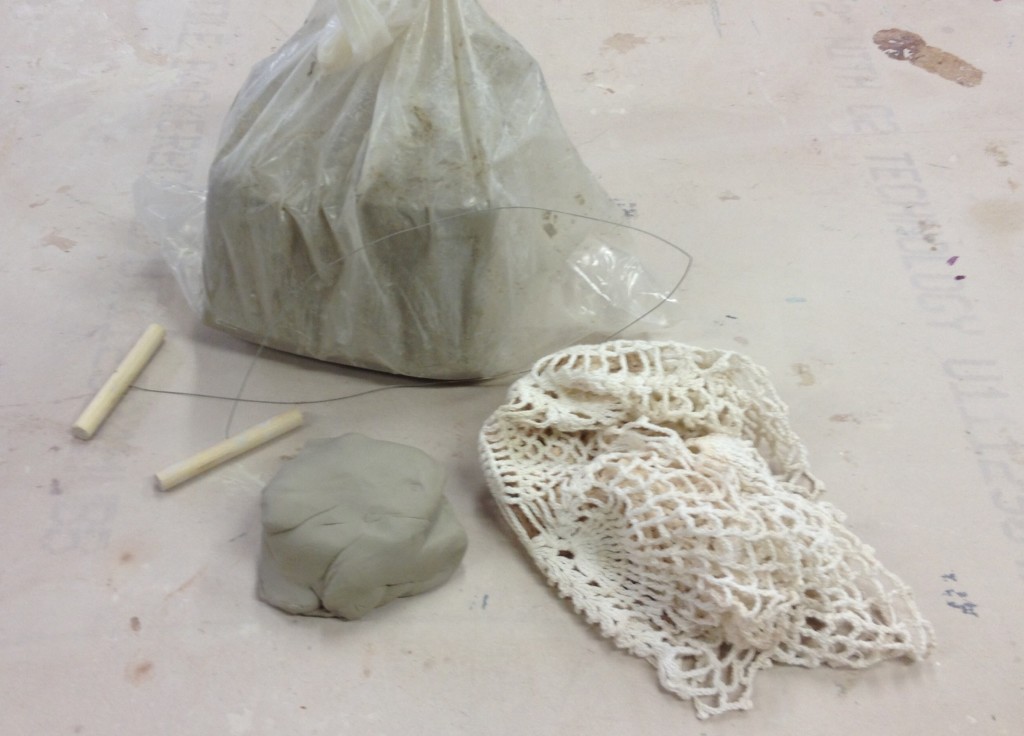 Wet clay and tools